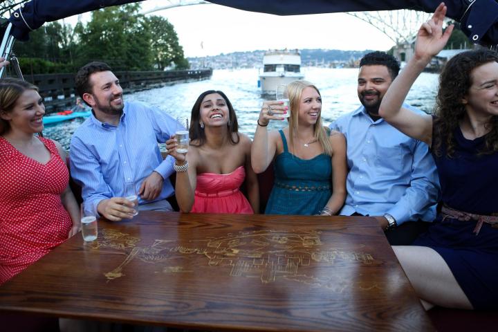 a group of people sitting at a table