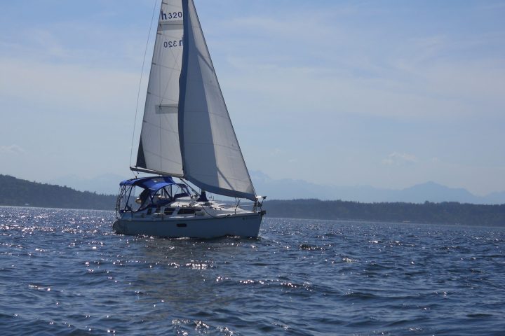 a small boat in a large body of water